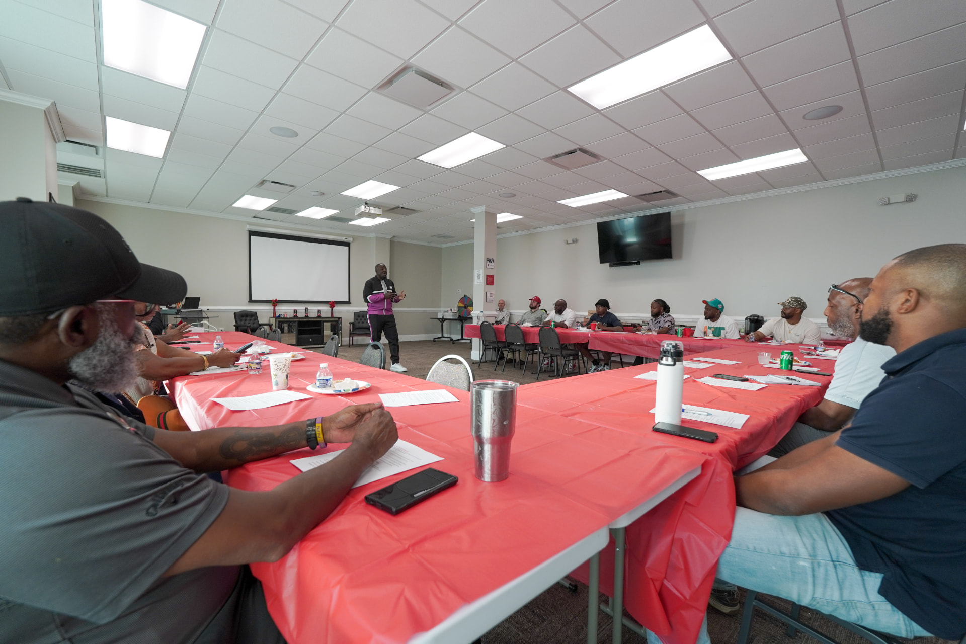 Men Matter members gathered in a brotherhood workshop, listening and engaged