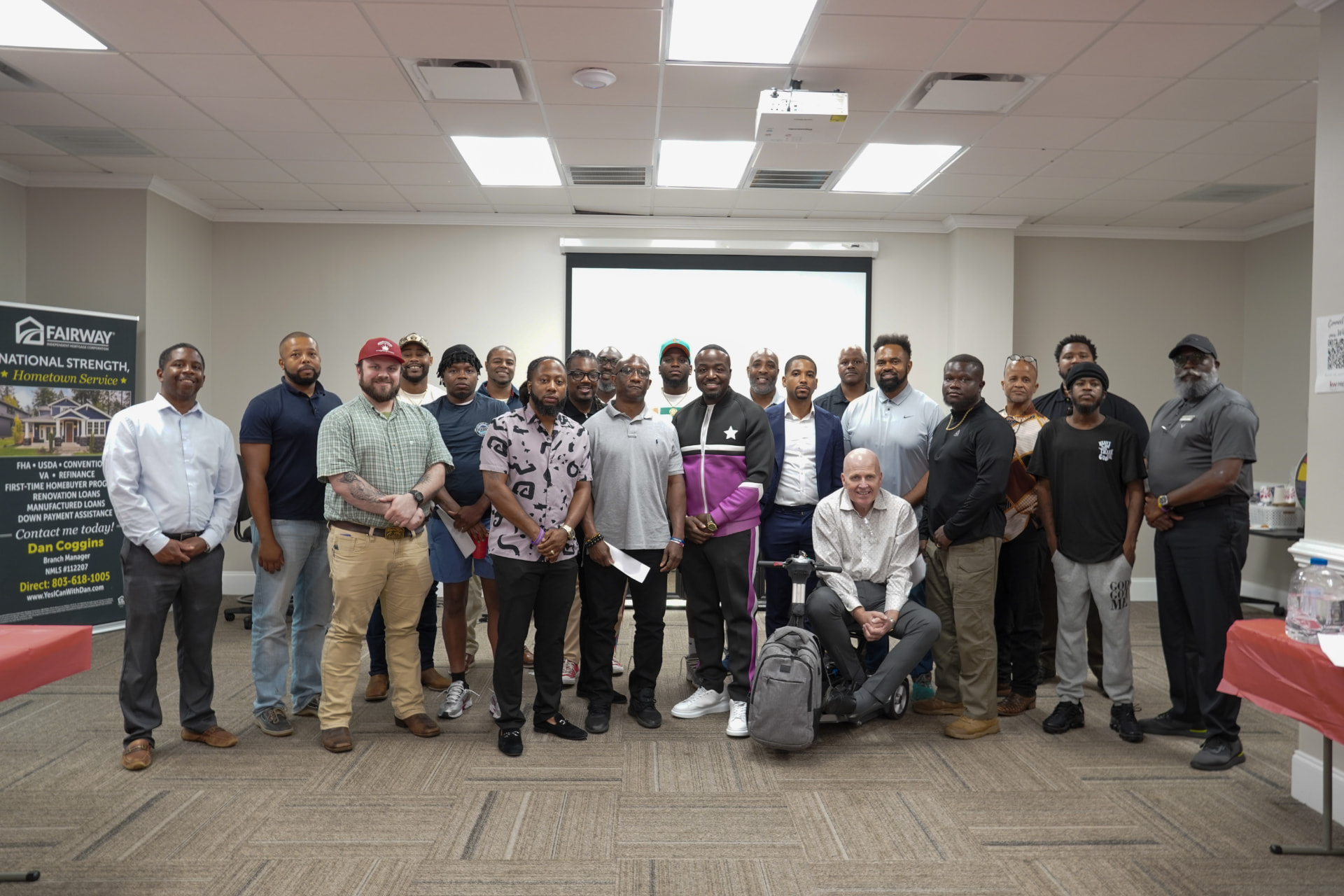 Men Matter brothers gathered together for a group photo at a community workshop